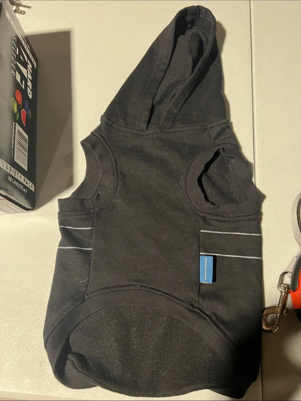 RuffWear Black Dog Hoodie with Silver and Red/Blue Accent Controls